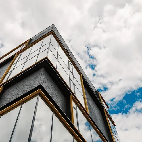 new-construction-office-building-with-blue-sky-in-2025-02-10-07-54-16-utc